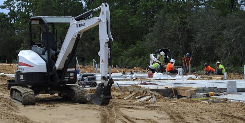 Construction site excavation and foundation preparation.