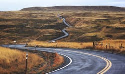 66fdb9cdde5fd13c2c547eae Pavedroadwindingthroughbrowngrasshillsoffintodista 66fdb9cdde5fd13c2c547eae Pavedroadwindingthroughbrowngrasshillsoffintodista