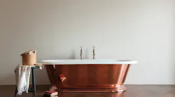 Luxury materials, metallic finishes, and updated traditional designs characterize current trends in faucets and fixtures, as shown by Drummonds’ Tay bathtub (All photos courtesy manufacturers)