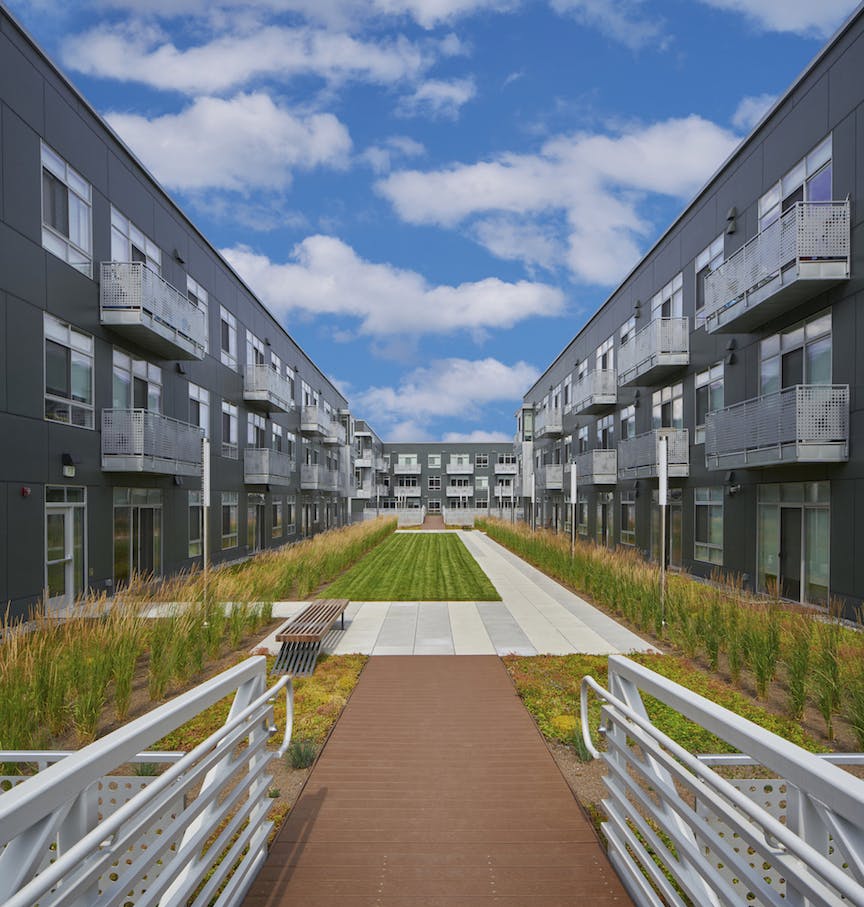 66fdb9eede5fd13ea2547eef Ducharme20place20courtyard20web 0