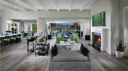 The family room in The New Home Company's Plan 2 model at Sky Ranch at Covenant Hills, in California, offers high-end buyers expansive views and luxury home features. (Photo: Eric Figge Photography)