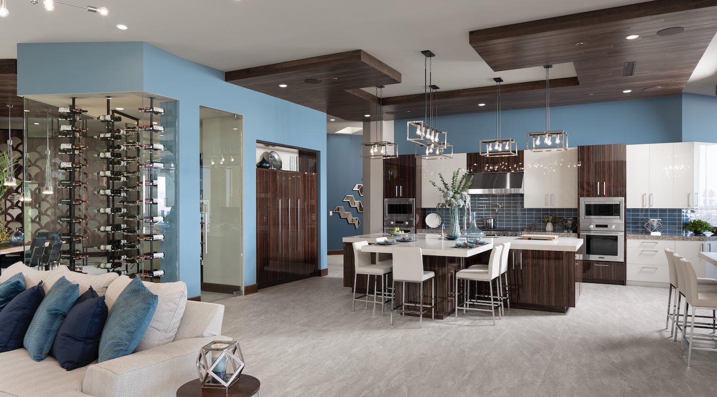 66fdba14e63fdc1cf34579e3 Newamericanhomekitchenislandwinestoragelivingroom