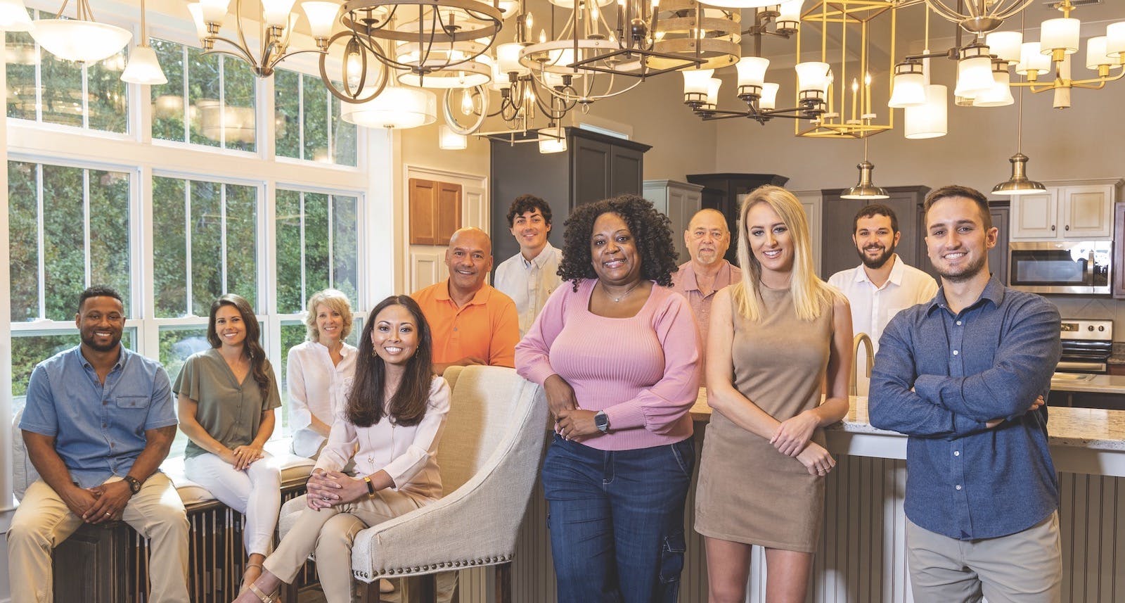 Many True Homes employees have been with the builder for at least a decade and some since the company started in 2007. From left, Ron Jenkins, personal builder; Melissa Podonsky, staff accountant; Paula Roth, land administration coordinator; Lyncel Earley, senior HR manager; Ruben Adjip, finance analyst/payroll manager; Parker Glaus, sales partner; Chan McCall, internet sales senior specialist; Allen Sturgill, client services quality manager; Olivia Walker, True advisor sales; Alex Giardina, estimator level III; and Brian Kehlor, internet sales specialist.