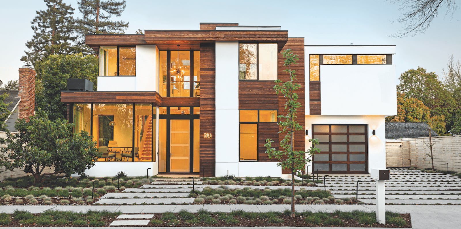 Striving to maintain a sense of personal history while meeting the needs of a 21st-century family, architect Donald Ruthroff, AIA, combined time-tested and new elements to create a modern version of the client&rsquo;s childhood home. &ldquo;The clean lines and strong street presence are clearly indicative of contemporary design,&rdquo; Ruthroff says. &ldquo;But we also worked to make it feel warm by incorporating natural wood elements that connect the structure to the outdoors,&rdquo; including a magnolia tree planted by the client&rsquo;s parents.