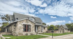 The extra-wide street frontage allowed space for a detached Studio, while a gently sloping walkway to the home’s raised front porch offers an “access-friendly” entrance. Stone window headers, low-profile gutters, and slivers of tapered stone just below the roofline are small but impactful details in this Arts and Crafts–inspired design. The extra-wide street frontage allowed space for a detached Studio, while a gently sloping walkway to the home’s raised front porch offers an “access-friendly” entrance. Stone window headers, low-profile gutters, and slivers of tapered stone just below the roofline are small but impactful details in this Arts and Crafts–inspired design.