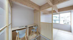 A Japanese firm has created a home with ceiling beams that double as tracks for sliding doors made of wood or glass. Photo courtesy New Home Trends Institute