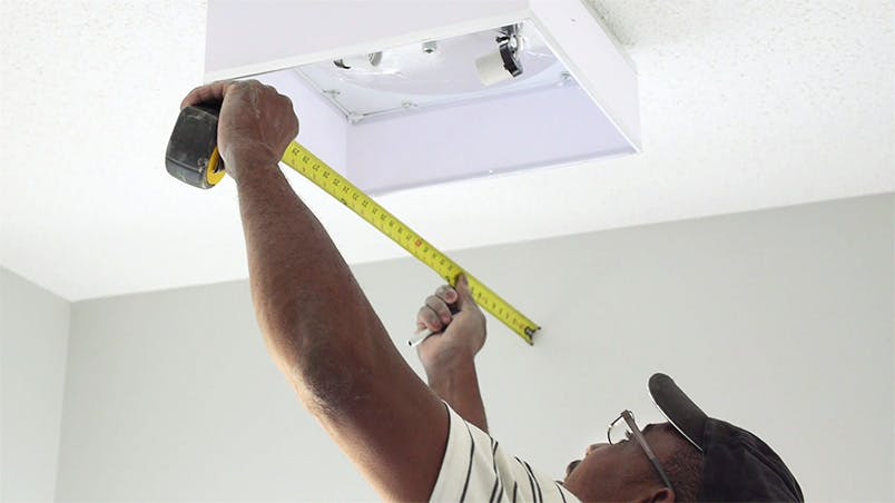 66fdbc60a897b51d7fb1f628 Electricianinstallsceilinglightnewhomeconstruction