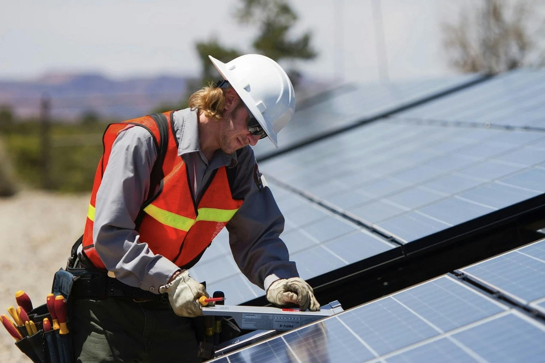 66fdbc77e1fd4a647fe1e832 Maninstallingsolarpanelsonroof