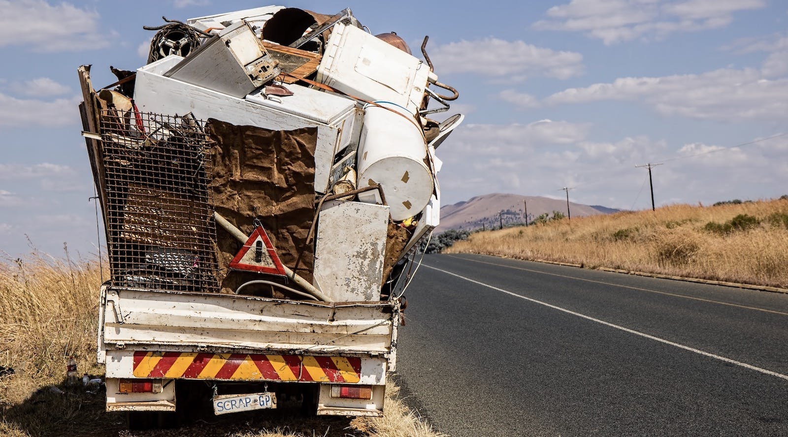 66fdbc813cabd9a92da6937f Scrapandgarbageontruckoverloaded