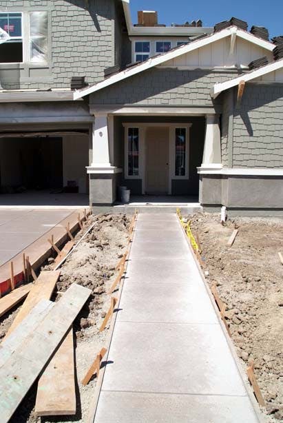 66fdbd53a897b500bdb1fa11 New20home20construction20sidewalk20copy