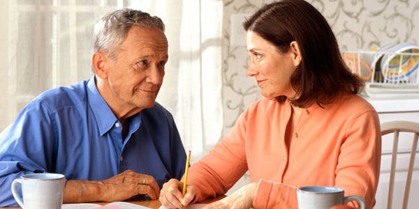 66fdbe68d4ea38996ba59999 Couple Sitting At A Table