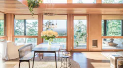Cedar Clad Soffits And An Architectural Light Shelf Brighten The Main Floor Via Redirected Light In Delphi House, Designed And Built By The Artisans Group