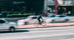 66fdc511a897b552eab2093b Bike20commuter20in20traffic20pxhere 66fdc511a897b552eab2093b Bike20commuter20in20traffic20pxhere