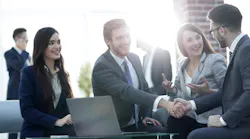 Successful partnership in business displayed by shaking hands in By ASDF - Adobe Stock
