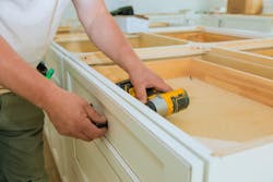 66fdc64f01d3bf67ebaf867a Man20using20power20drill20to20assemble20kitchen20c 66fdc64f01d3bf67ebaf867a Man20using20power20drill20to20assemble20kitchen20c
