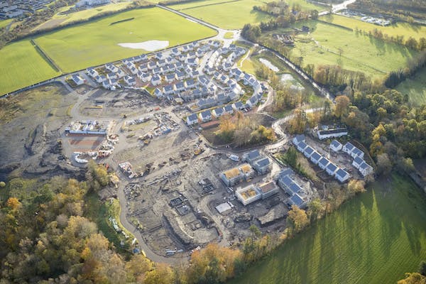 66fdc69a36c97ef7758b6ef7 Aerialofhousingconstruction