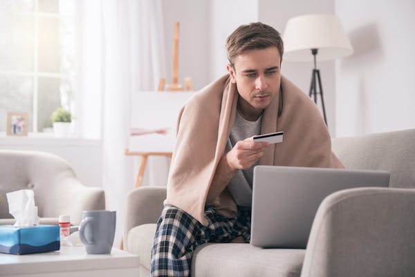 66fdc6a8a897b51540b20c34 Manlookingatcreditcard