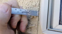 No gap is no good. Dissimilar materials such as stucco and vinyl window frames react to outdoor climate conditions differently, requiring an adequate gap between them to mitigate surface cracking ... and worse | Photo: courtesy IBACOS