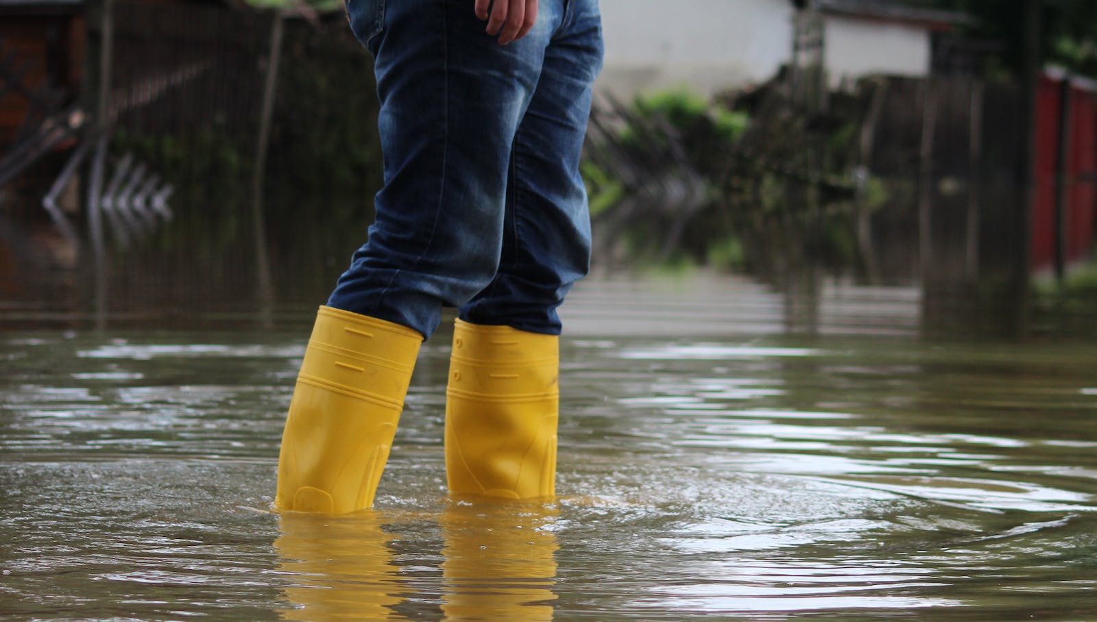 66fdc807d4ea380022a5aa70 Person20weating20yellow20boots20in20a20flood