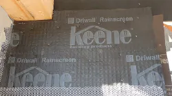 Keene Driwall Rainscreen is rolled out behind the lath of a stucco wall finish assembly to protect structural elements from water intrusion. | Image: courtesy IBACOS
