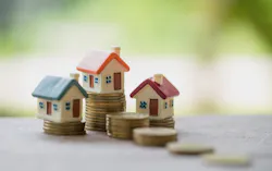 66fdca4fdbd68e1aec4abcfe Houses20stacked20on20coinsmin