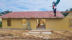 Installation of SIPanels at a Bettr Homes construction site. Photo courtesy Bettr Homes