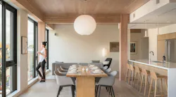 The eight-story Carbon12 building features floor-to-ceiling windows, exposed mass timber, and natural light throughout. Photo courtesy Mercer Mass Timber