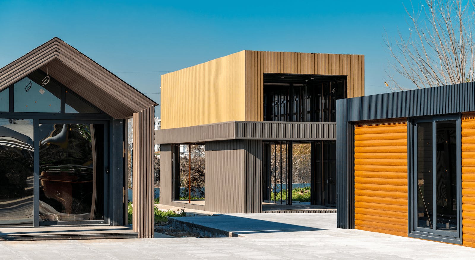 As More Metros Relax Their Zoning Regulations In An Effort To Provide A Greater Variety Of Housing Options, Tiny Homes Like These Are Being Offered As One Solution | Image: Yalcinsonat / Stock adobe