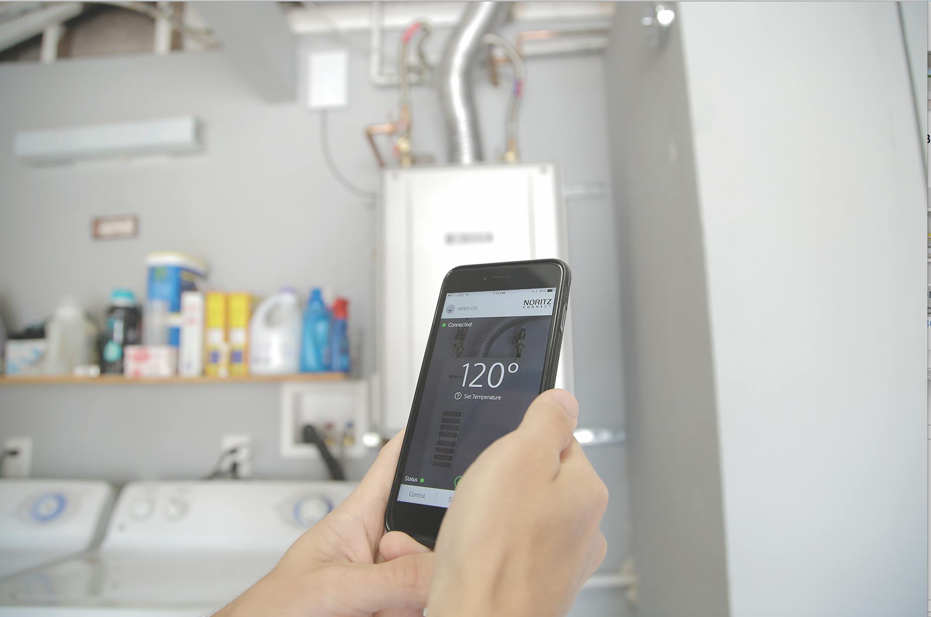 66fdce50e1fd4ad364e20f29 Noritz20wifi20adapter20with20hand20holding20smart2