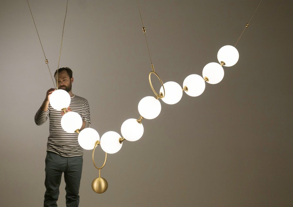 66fdced4a5dba033a84644ae Laroseguyoncocolightfixturewithman