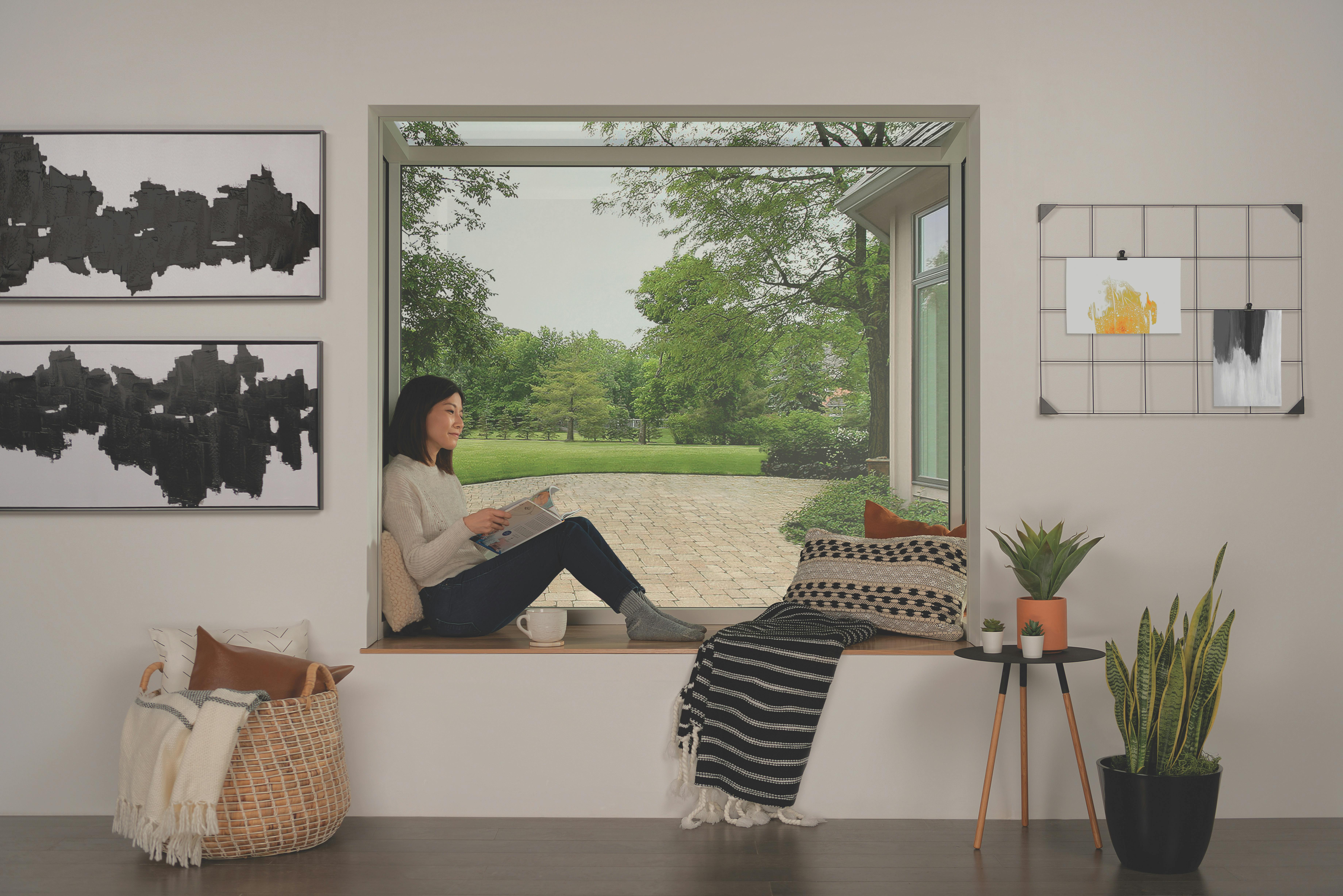 66fdcf1edbd68e44e64ac797 Marvinskycovewomansittingwithbook