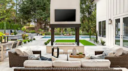 Outdoor living features that are on-trend for homebuyers include outdoor TVs like this one
