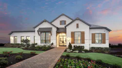 During 2022, the time it took Highland Homes to construct a home extended from about 150 days to perhaps 250 days, with costs rising due to supply chain issues and labor shortages, causing the company to rethink and revise its strategy. Shown: Elevation C of the Turin model in Leander, Tex.