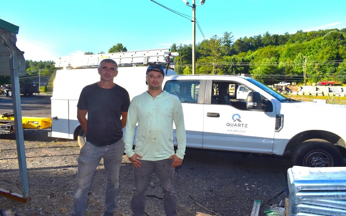 Andrii Korsun and Anton Nahornyi fled Ukraine with their families after the Russian invasion. They resettled in the Asheville, N.C., area with help from Lutheran Services Carolinas. Today, they have construction jobs with Quartz Properties Management.