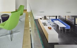 Conversation area with chairs looking down into kitchen Conversation area with chairs looking down into kitchen