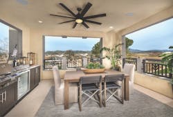Covered roof deck with outdoor kitchen and openings that frame views Covered roof deck with outdoor kitchen and openings that frame views