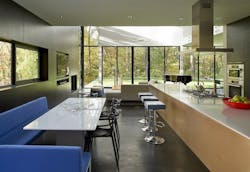 Kitchen and breakfast room of modern house, big glass, transitions to living room Kitchen and breakfast room of modern house, big glass, transitions to living room