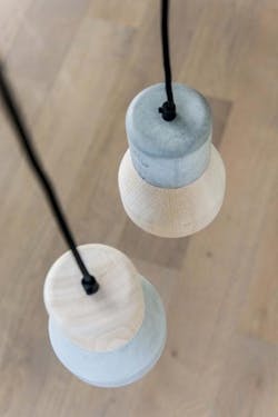 Specimen Editions by Thinkk Studio wood and concrete pendants Specimen Editions by Thinkk Studio wood and concrete pendants