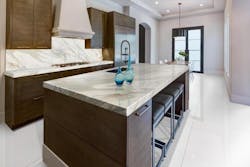 Neolith Calacatta Gold Island and backsplash Neolith Calacatta Gold Island and backsplash