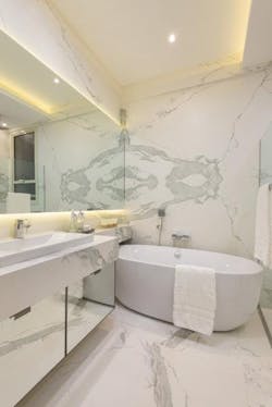 Neolith sintered stone surface in dark gray estatuario Neolith sintered stone surface in dark gray estatuario