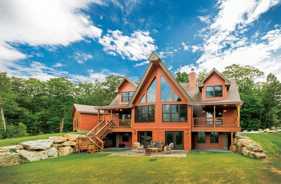 This 2,400-square-foot ski retreat in Killington, Vt., features big, chalet-style windows and additional windows throughout each room that allow plenty of light and views from the mountaintop site.