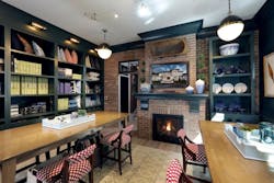 A Napoleon Sta Rfire Fireplace With Traditional Brick Surround Welcomes Clients Into A Flexible Work Space On The Main Level A Napoleon Sta Rfire Fireplace With Traditional Brick Surround Welcomes Clients Into A Flexible Work Space On The Main Level