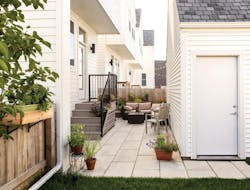 White James Hardie exterior fiber-cement siding on Basecamp Chicago White James Hardie exterior fiber-cement siding on Basecamp Chicago