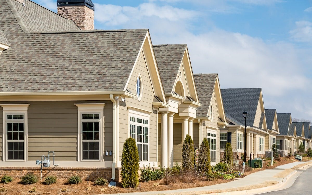 A row of single-family homes in a newly developed community