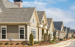 A row of single-family homes in a newly developed community A row of single-family homes in a newly developed community