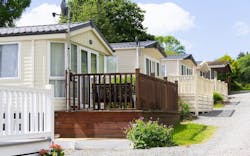 Row of single-level manufactured homes Row of single-level manufactured homes