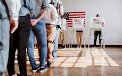 Voters line up to use voting booth in U.S. election Voters line up to use voting booth in U.S. election