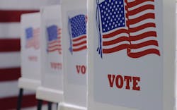 A row of voting booths A row of voting booths