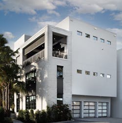 Rear elevation and garage of The New American Home 2021 Rear elevation and garage of The New American Home 2021