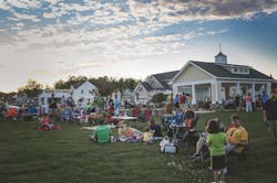 families socializing at Providence Pavilion master planned community event families socializing at Providence Pavilion master planned community event